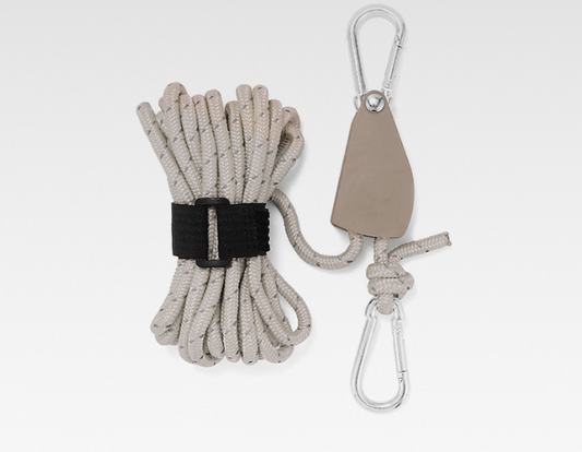 AlphaLife247 adjustable ratchet pulley tie-down system with reflective rope and carbon steel carabiners, optimized for camping shelters and cargo securing.