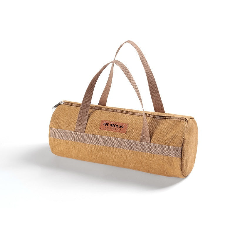 An AlphaLife247 canvas cylindrical storage bag in brown, featuring reinforced handles and a double-layer thickened design, ideal for organizing tent stakes, rope, and essential field tools.