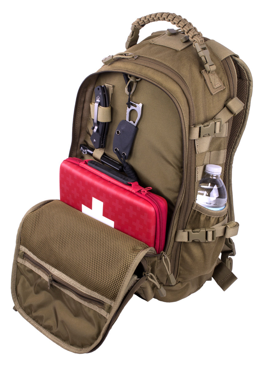 Brown tactical backpack with red first aid kit and water bottle on a white background