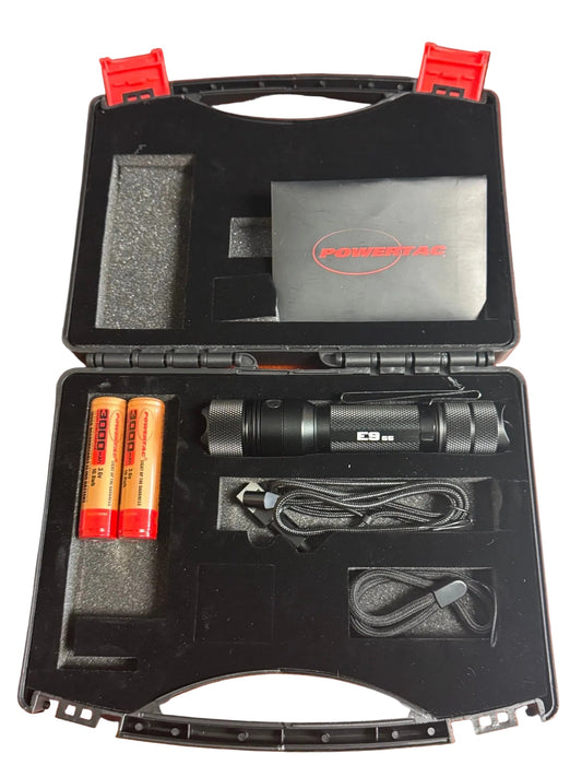 The AlphaLife247 E9 GEN5 Power Bundle is a 3,000-lumen tactical flashlight, showcasing spare 18650 batteries, USB charging cable, and complete kit organized in a rugged hard shell carrying case, designed for reliable use in emergency preparedness, extended field missions, and tactical operations.