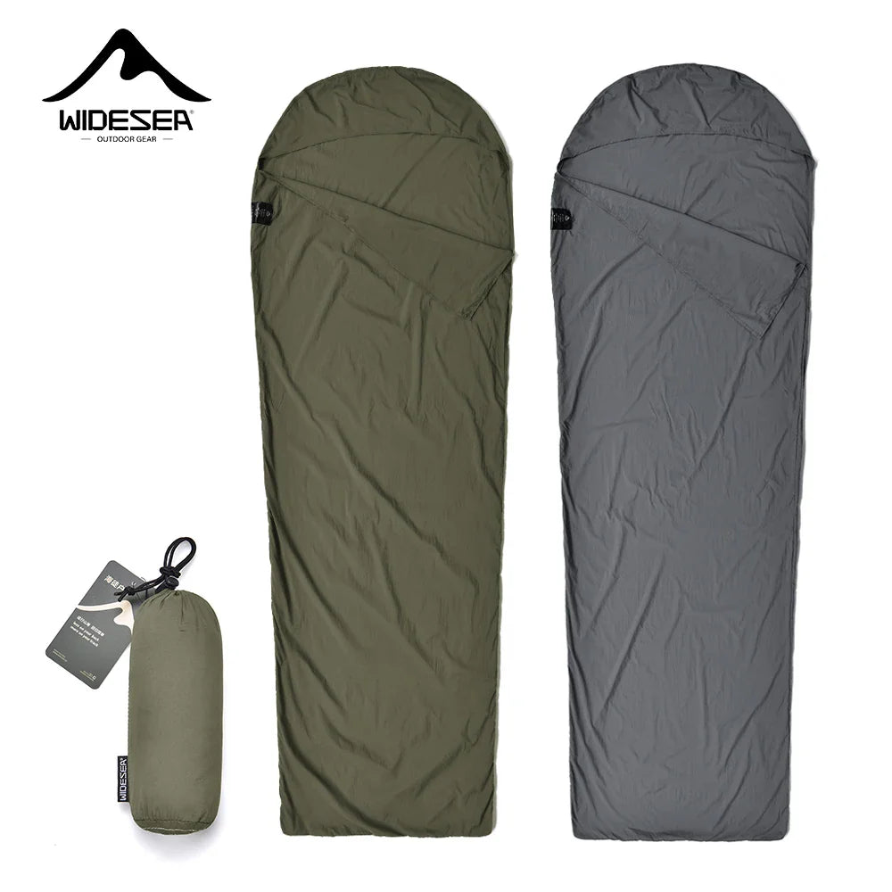 An AlphaLife247 Widesea brand mummy-style ultralight sleeping bag liner, showcased in both green and gray colors on a white background, highlighting its compact design for expedition hygiene and thermal regulation.