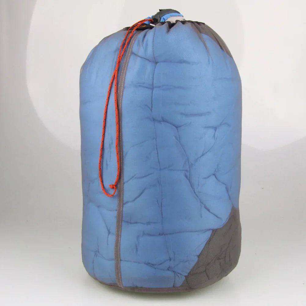 An AlphaLife247 ultralight drawstring mesh stuff sack in gray, showcasing its breathable design and round-base construction, ideal for organizing and drying expedition gear.