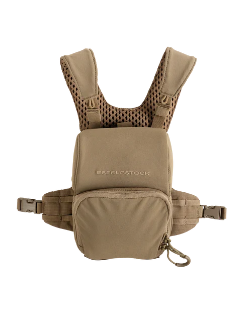 An AlphaLife247 Eberlestock Bravo Modular Bino Pack with magnet-free shock cord closure and MOLLE side wings, showcasing its breathable air-mesh harness and modular design, built for reliable binocular carry during hunting, precision shooting, and compass-critical navigation missions.